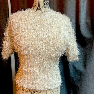 New fluffy metallic knit sweater in gold lurex.